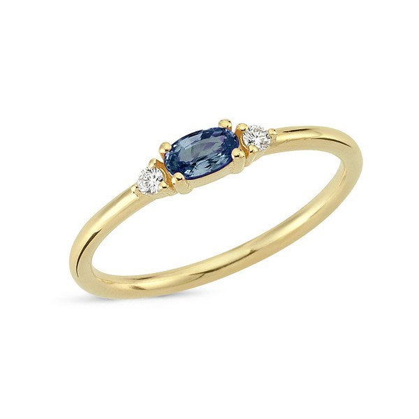 Petit ring i 14 karat guld med oval blå safir og diamanter – Nuran